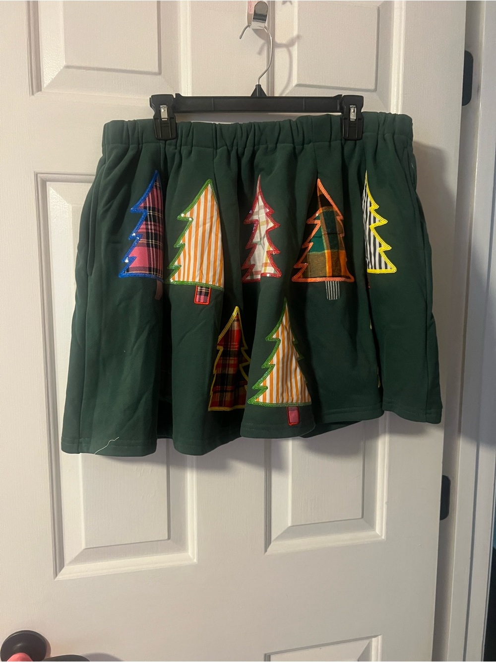 QUEEN OF SPARKLES Dark Green Circle Skirt with Multicolor Tree Appliqués